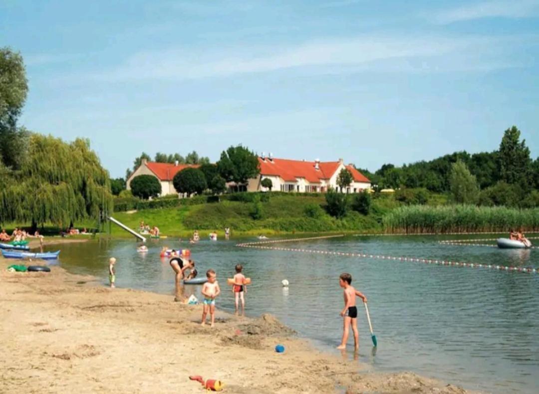 7 Person House With Garden, Firepit, Swimming Lake, Hammock, Child Friendly, In- And Outside Playground, Slide, And Great Coffee Ewijk Buitenkant foto